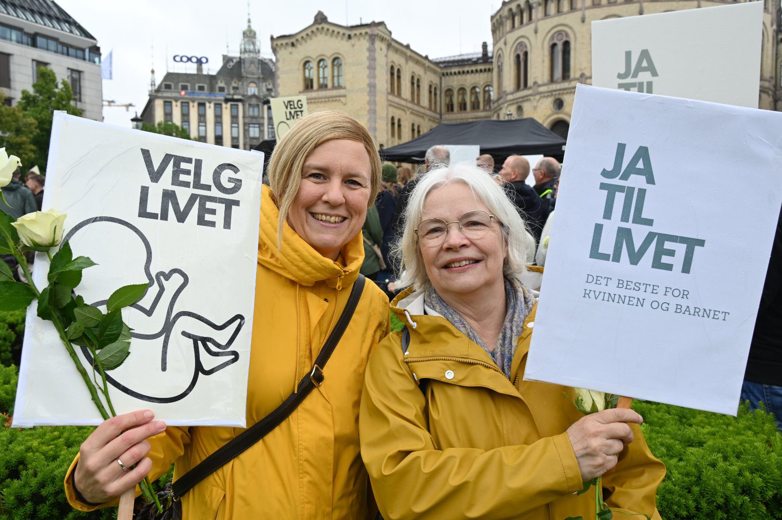 Ragnhild Helena Aadland Høen with Maria Fongen, Family Pastoral Adviser for the Catholic Diocese of Oslo. The Norwegian Parliament building (Stortinget) can be seen in the background.
